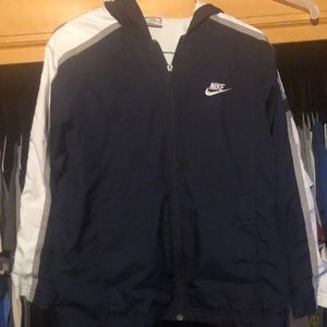 Blue and white Nike windbreaker